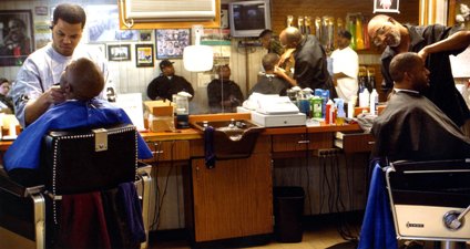 Archival photograph of barbers working at Larry’s