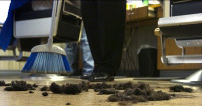 Hair swept from the floor between cuts